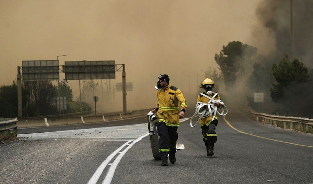 Israeli firefighters work to extinguish a forest fire burning near occupied al-Quds, Wednesday, April 30, 2025. (AP) Israeli firefighters work to extinguish a forest fire burning near occupied al-Quds, Wednesday, April 30, 2025. (AP)