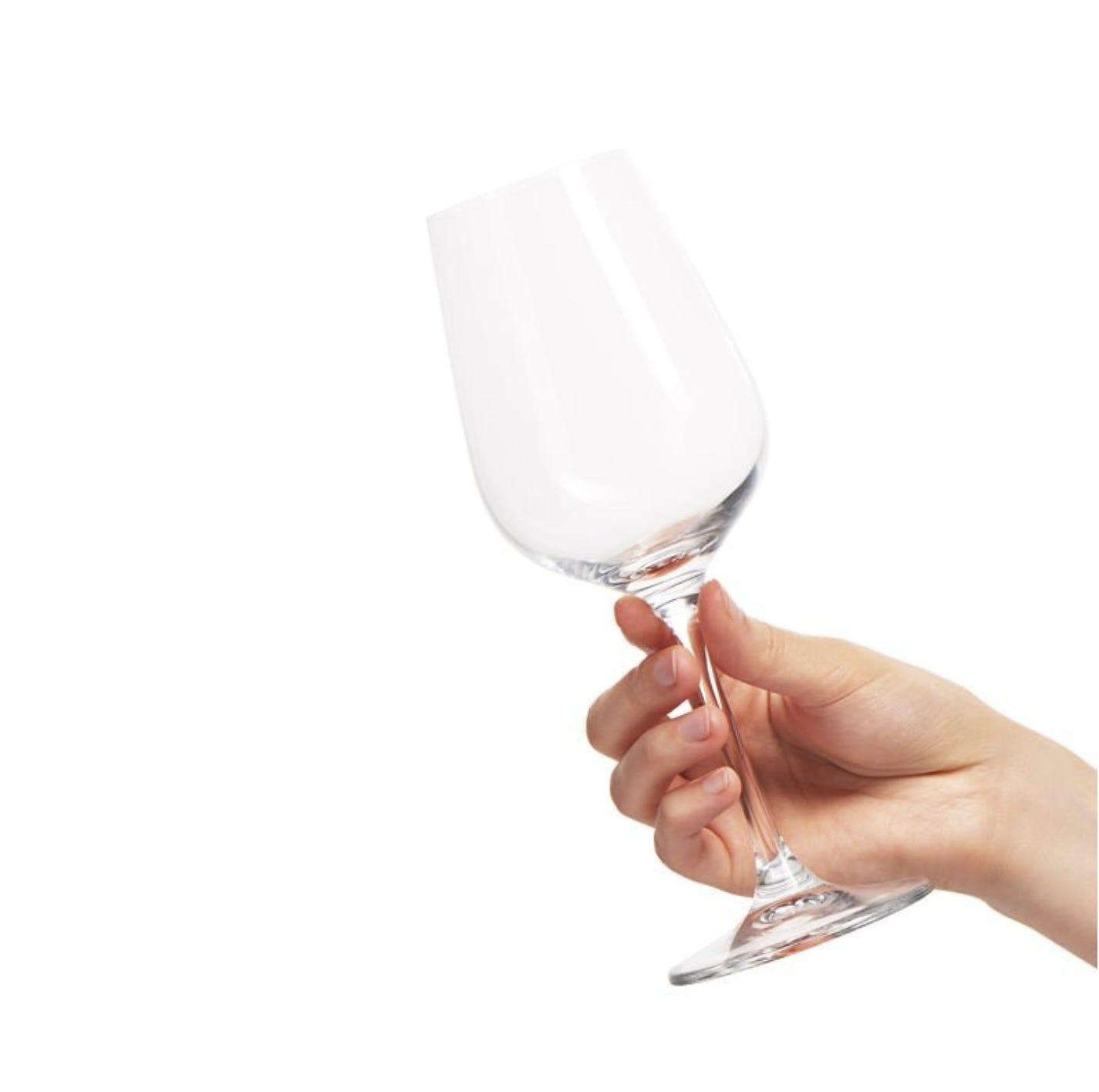 Hand holding out an empty wine glass.