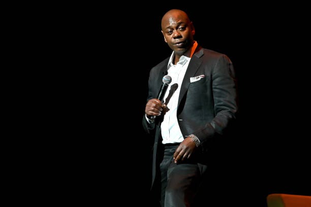 Dave Chappelle speaks onstage during the Dave Chappelle theatre dedication ceremony at Duke Ellington School of the Arts on June 20, 2022 in...