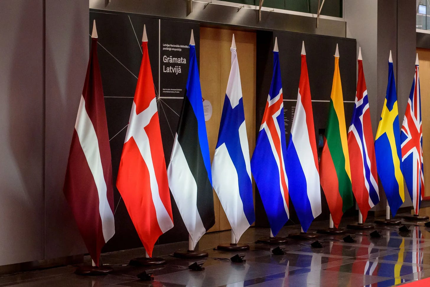 The national flags of (from left) Latvia, Denmark, Estonia, Finland, Iceland, the Netherlands, Lithuania, Norway, Sweden