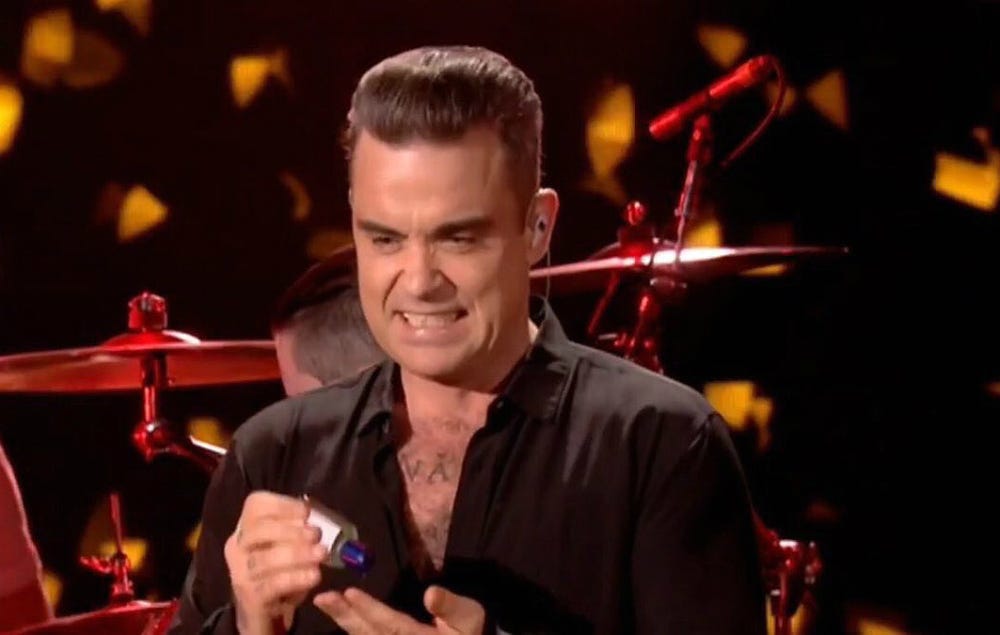 Robbie Williams looks back on 'mind-fucking' hand-sanitiser incident
