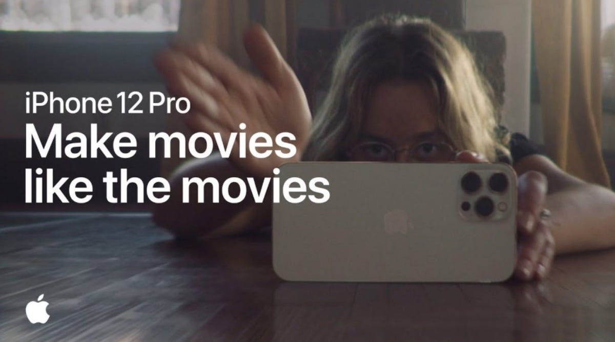 Girl lies on the floor with her iPhone. The text reads "Make movies like the movies"​