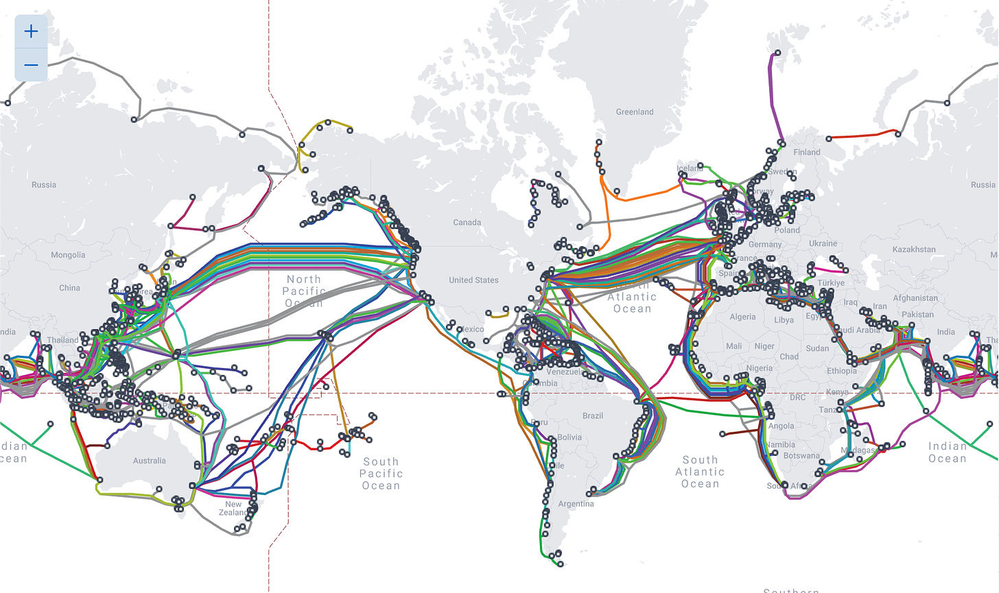 A map of global submarine cables. Colorful lines go from continent to continent.