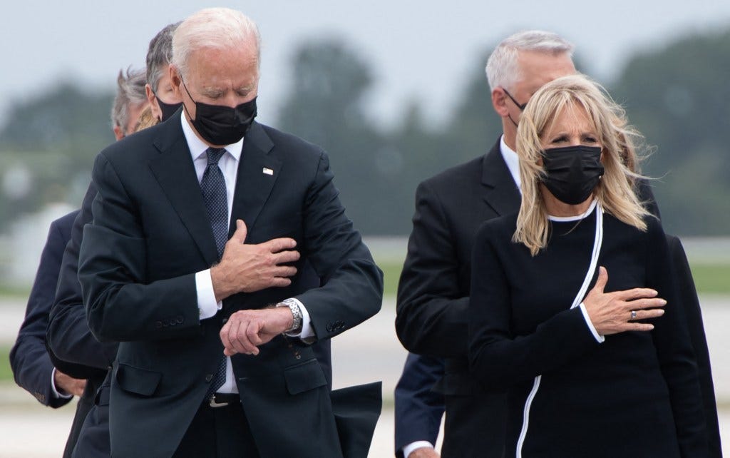 Was Biden looking at his watch during ceremony for Marines killed in Kabul?