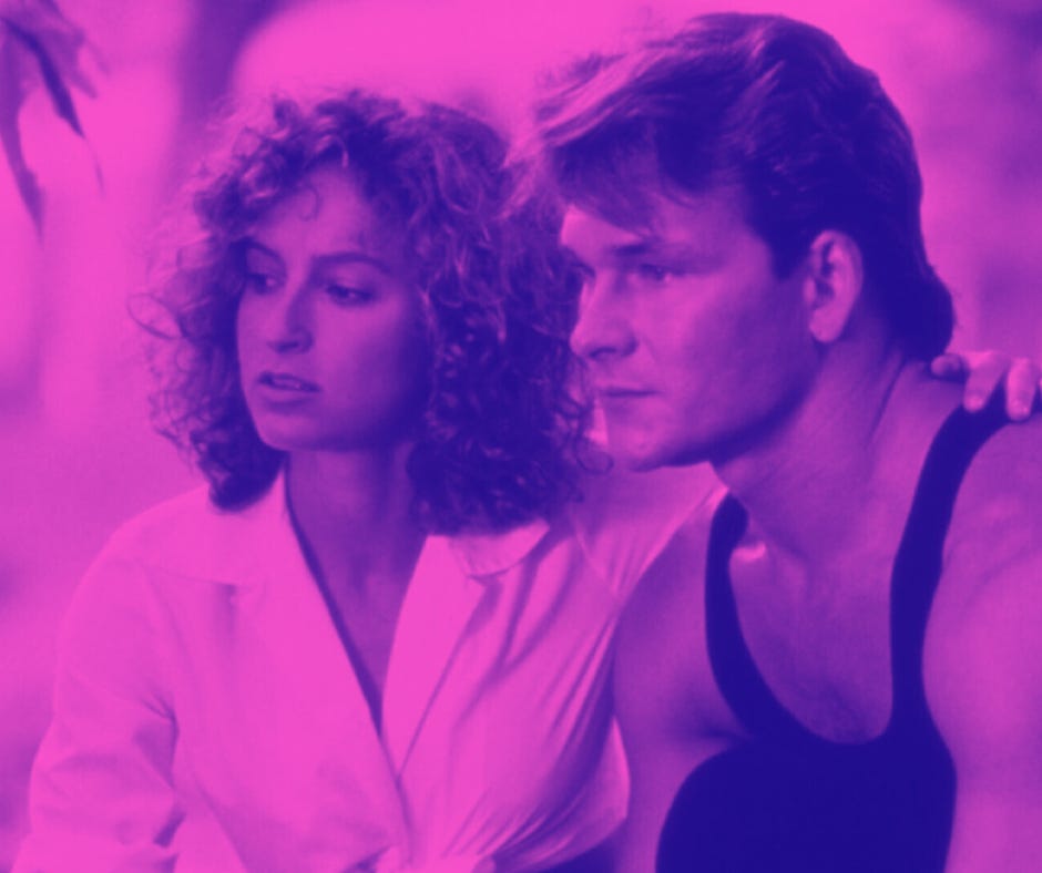 A still frame from "Dirty Dancing" shows Jennifer Gray and Patrick Swayze arm-in-arm and staring off to the right, both looking very hot. The still is rendered in bisexual coloring: pink and purple and blue.