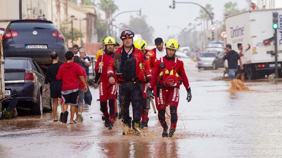 Spain floods: Rescues underway in Valencia as a year's rain falls in a day  - BBC Newsround