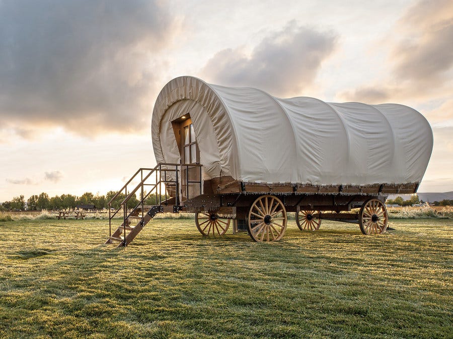 Travel Across the USA and Stay in a Modern Conestoga® Wagon in 25 States