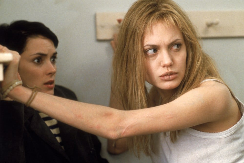 Elisabeth Moss Reveals 'Girl Interrupted' Divided Set: Ryder vs Jolie