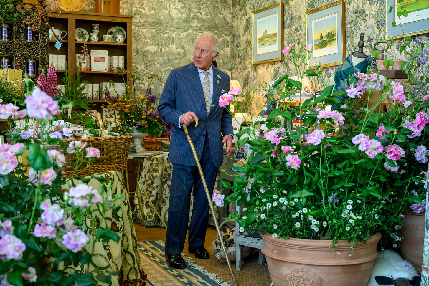 King Charles surrounded by flowers