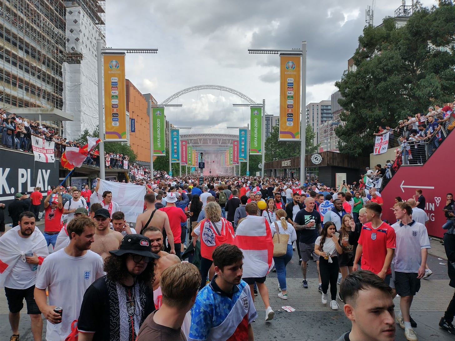 england fans walking along wembley way
