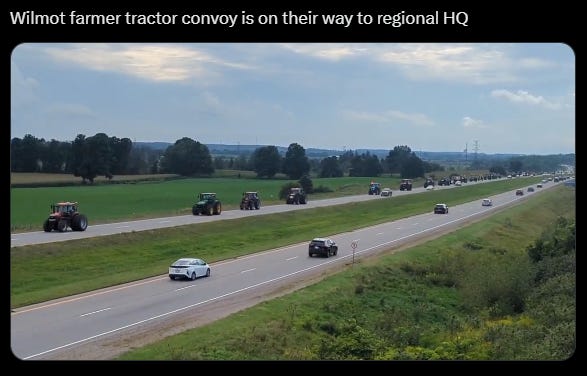 Screenshot from X showing an image of the tractors making their way down the road.