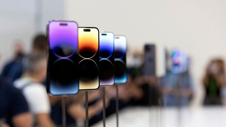 TOPSHOT - The new iPhone 14 and 14 Plus is displayed during a launch event for new products at Apple Park in Cupertino, California, on September 7, 2022. - Apple unveiled several new products including a new iPhone 14 and 14 Pro, three Apple watches, and new AirPod Pros during the event. (Photo by Brittany Hosea-Small / AFP) (Photo by BRITTANY HOSEA-SMALL/AFP via Getty Images)