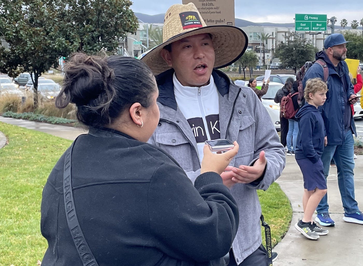 Steve Nunez, right, of Escondido help organize Friday’s protest in San Marcos of President Donald Trump’s immigration and deportation policy. Steve Puterski photo