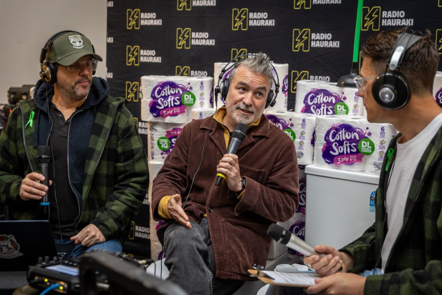 Dai Henwood (centre) with Radio Hauraki's Matt Heath and Jeremy Wells at the Day in Loo, a 12-hour bowel cancer bathroom fundraiser. Photo / Michael Craig 