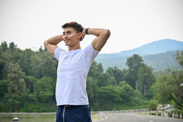 Premium Photo | Sporty fit asian man put his hands behind his head resting  after had a long run