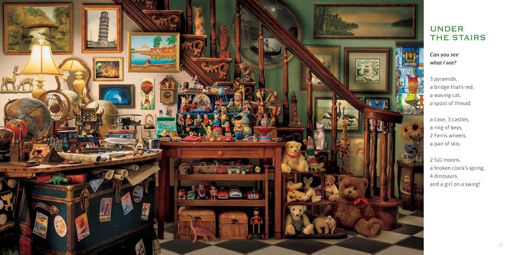 A space under a staircase, with lots of pictures on the wall and stack of teddy bears