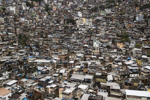 16 million people live in neighborhoods Brazil calls 'subnormal.' It's  finally changing the name | AP News