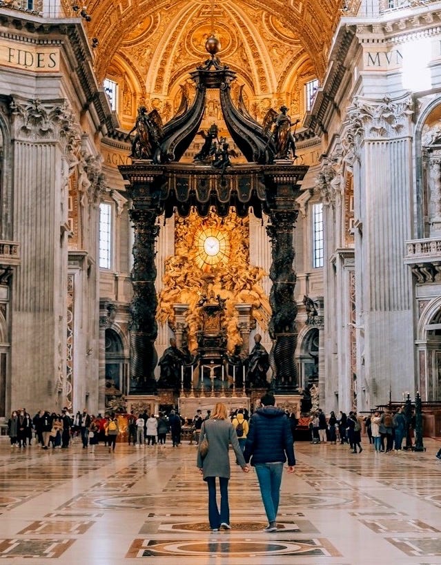 a couple of people that are standing in a building
