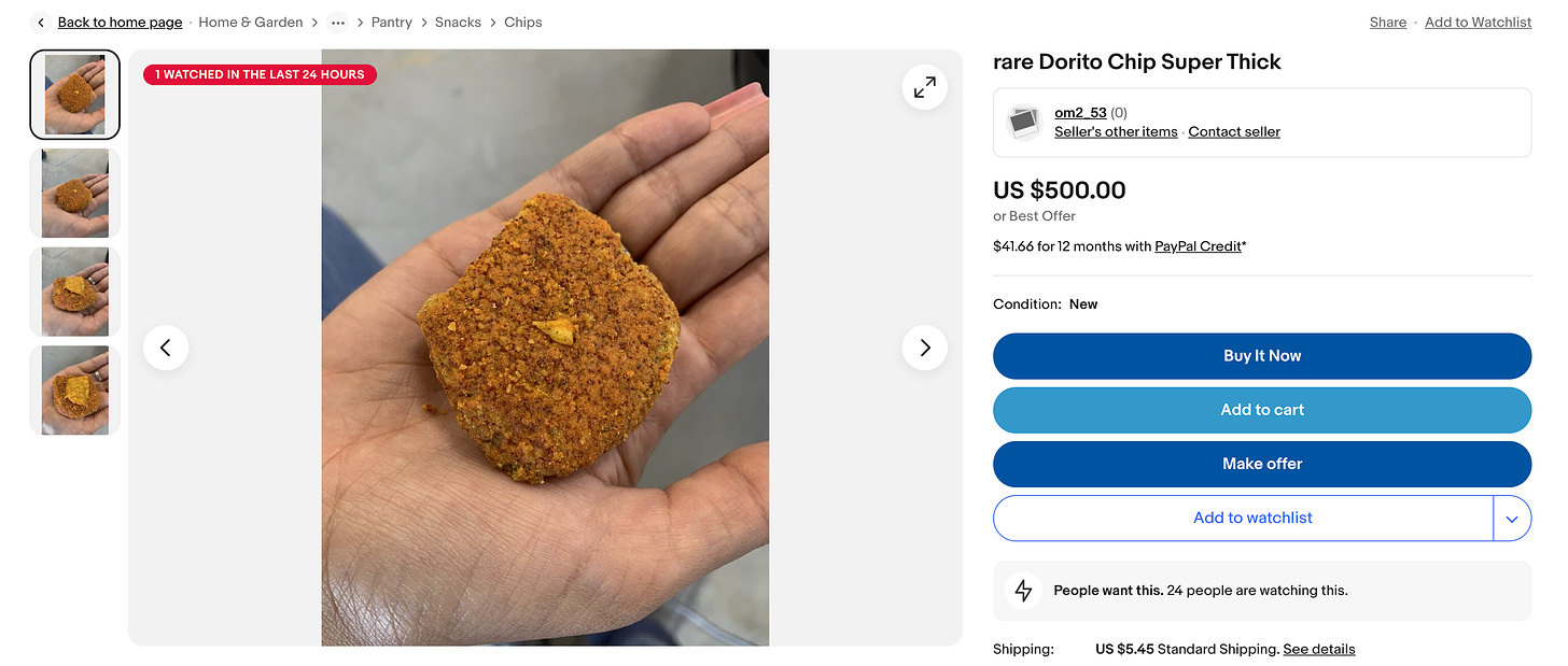 eBay listing for the Rare Dorito Chip Super Thick. A close up of the image from earlier. It kind of just looks like a big blob of seasoning. It's palm-sized.