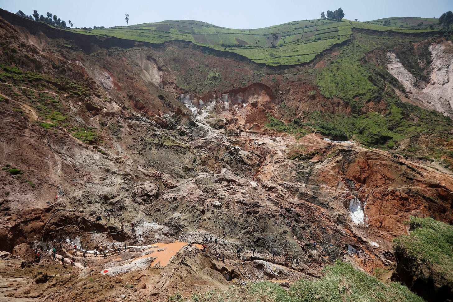 Labourers work at a mine