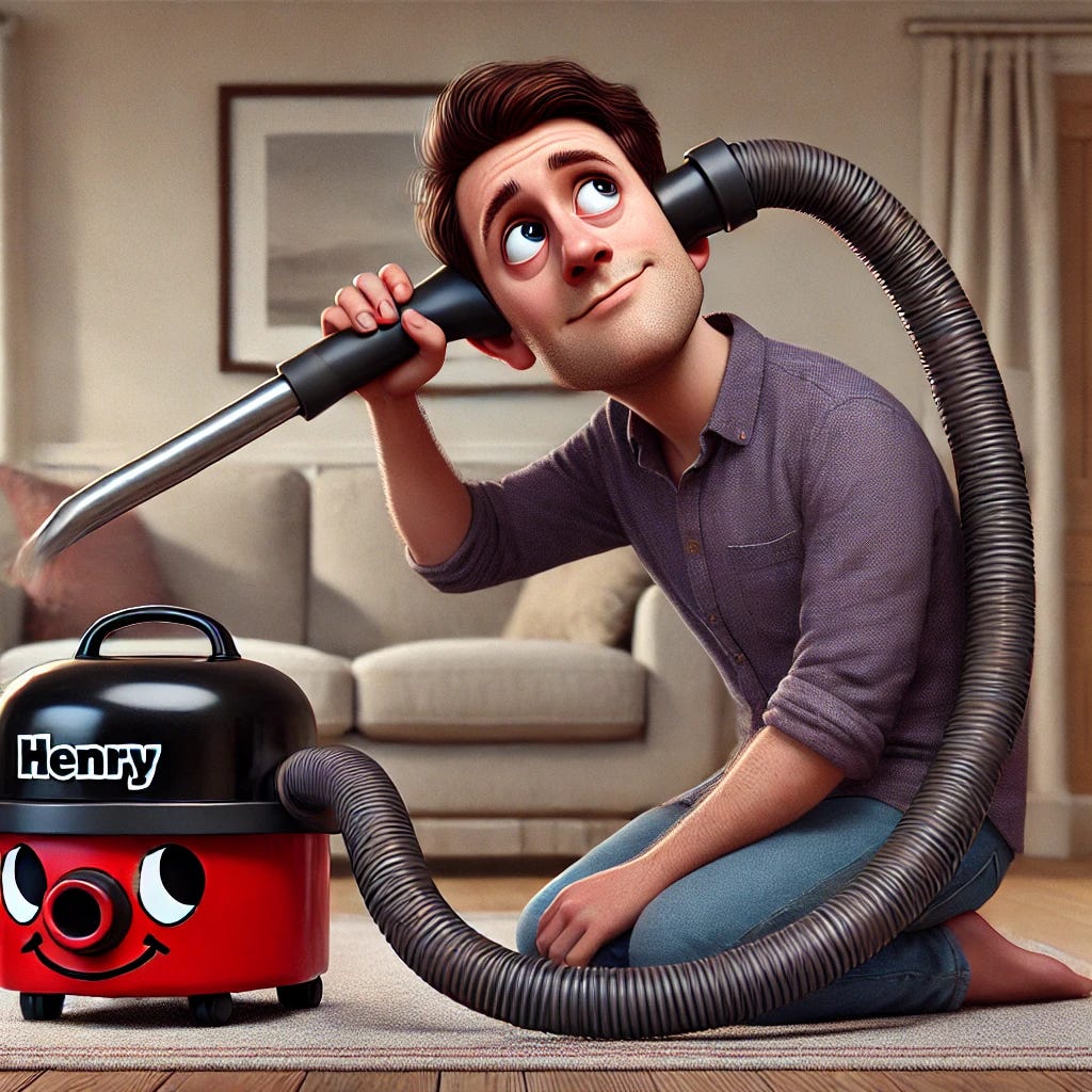 A humorous illustration of a man holding the hose of a red Henry hoover directly to his ear as if attempting to vacuum it. The end of the hoover hose is dark grey or black, not red. The man looks confused and slightly disoriented, wearing casual clothes in a cosy home setting. The Henry hoover sits nearby with its cheerful face still smiling, creating a funny contrast. The background is a simple living room with a neutral colour palette and soft lighting.