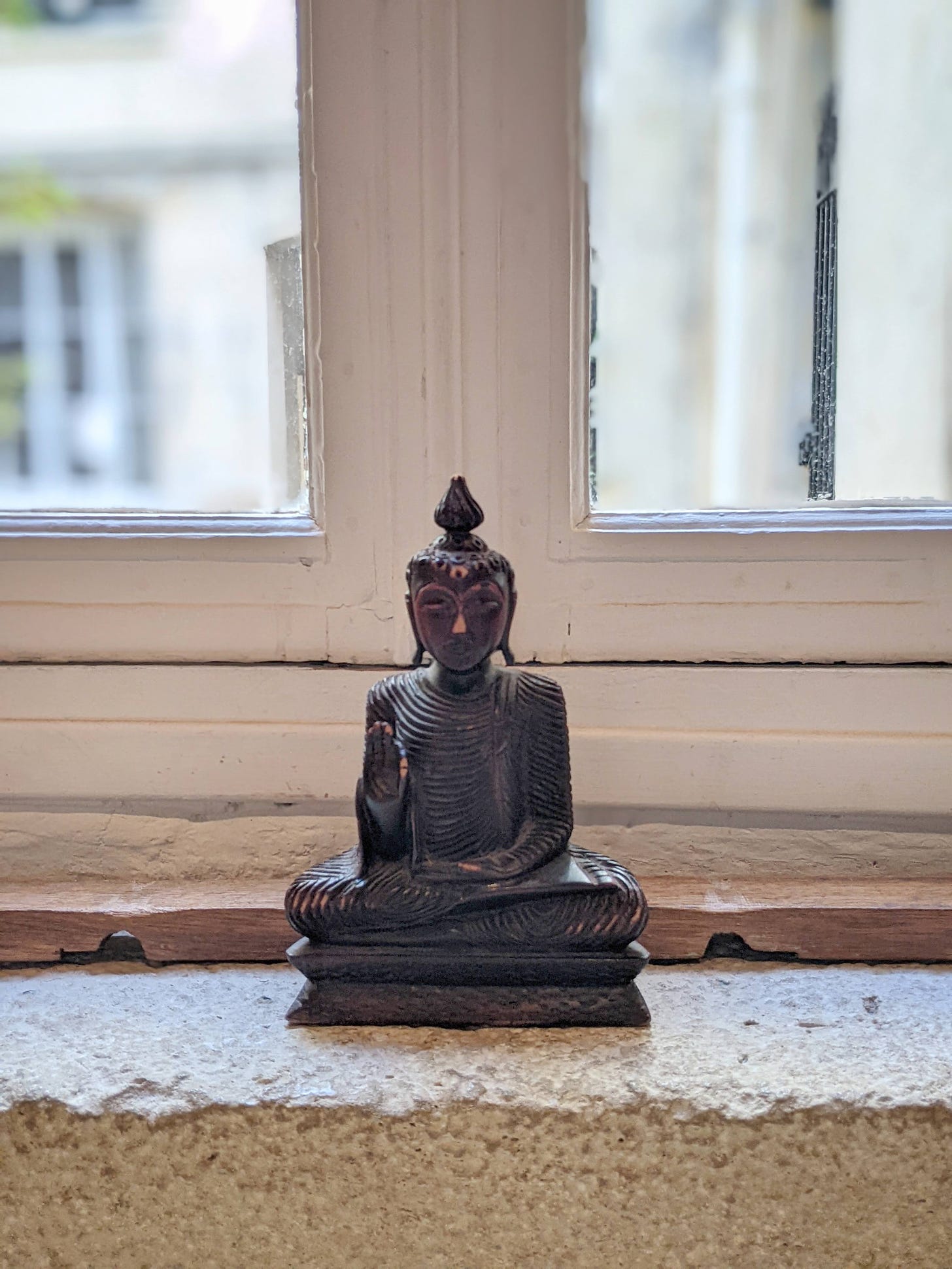 Buddha murti at yoga studio in Paris, France