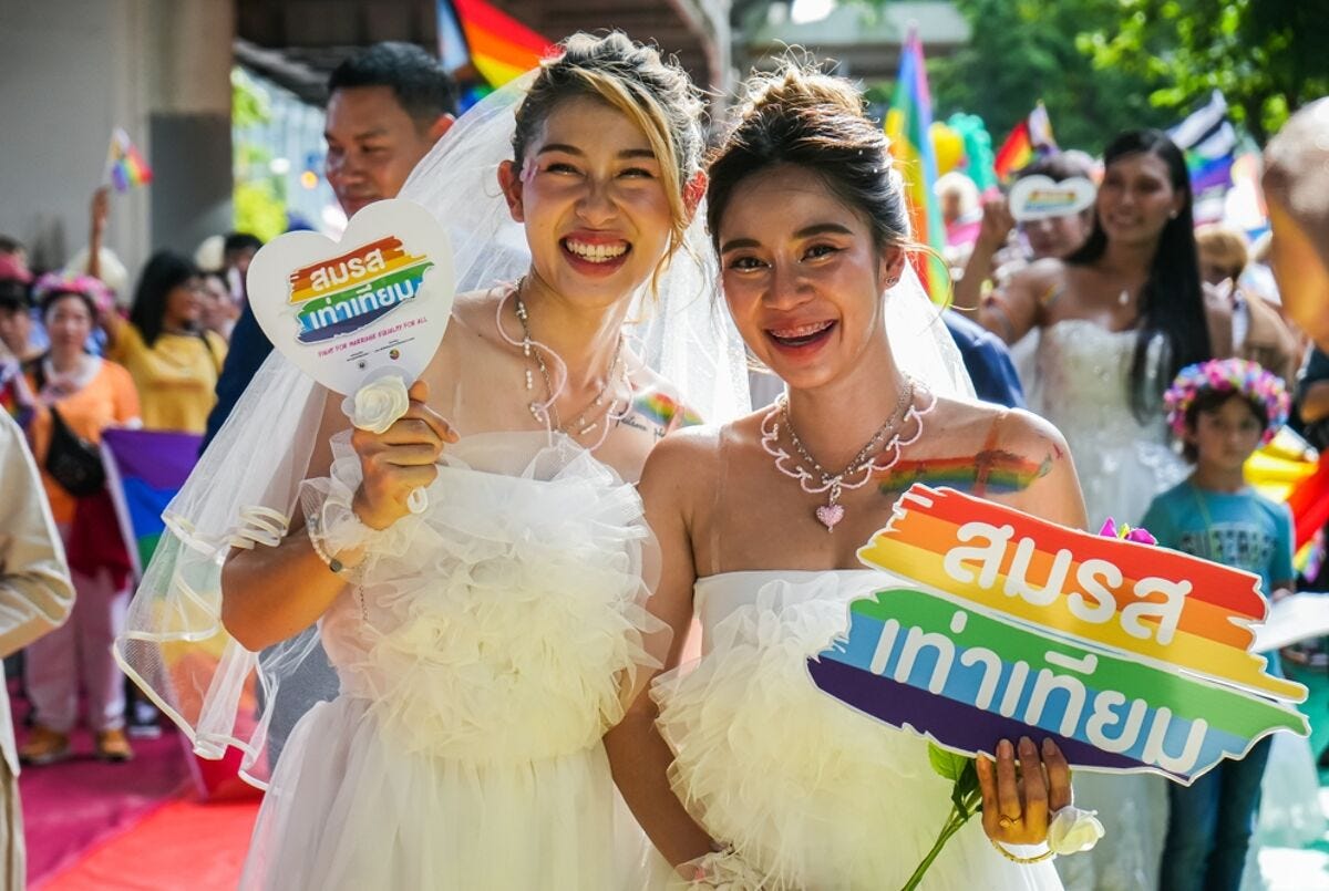 Thousands of LGBTQ+ people and their supporters march through central Bangkok on June 4, 2023, marking Pride month