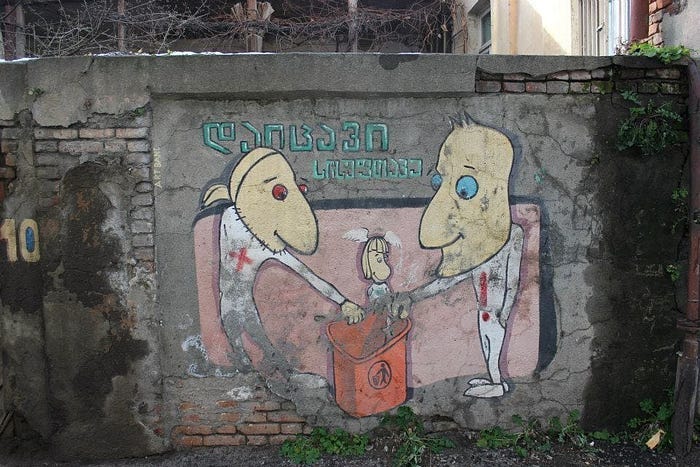 Street art on a borken wall