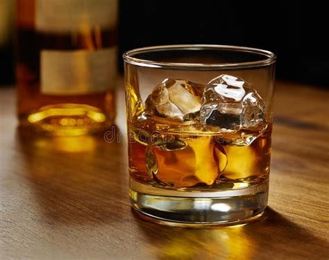 Glass of Whiskey on the Rocks Stock Photo - Image of liquor, alcoholic ...