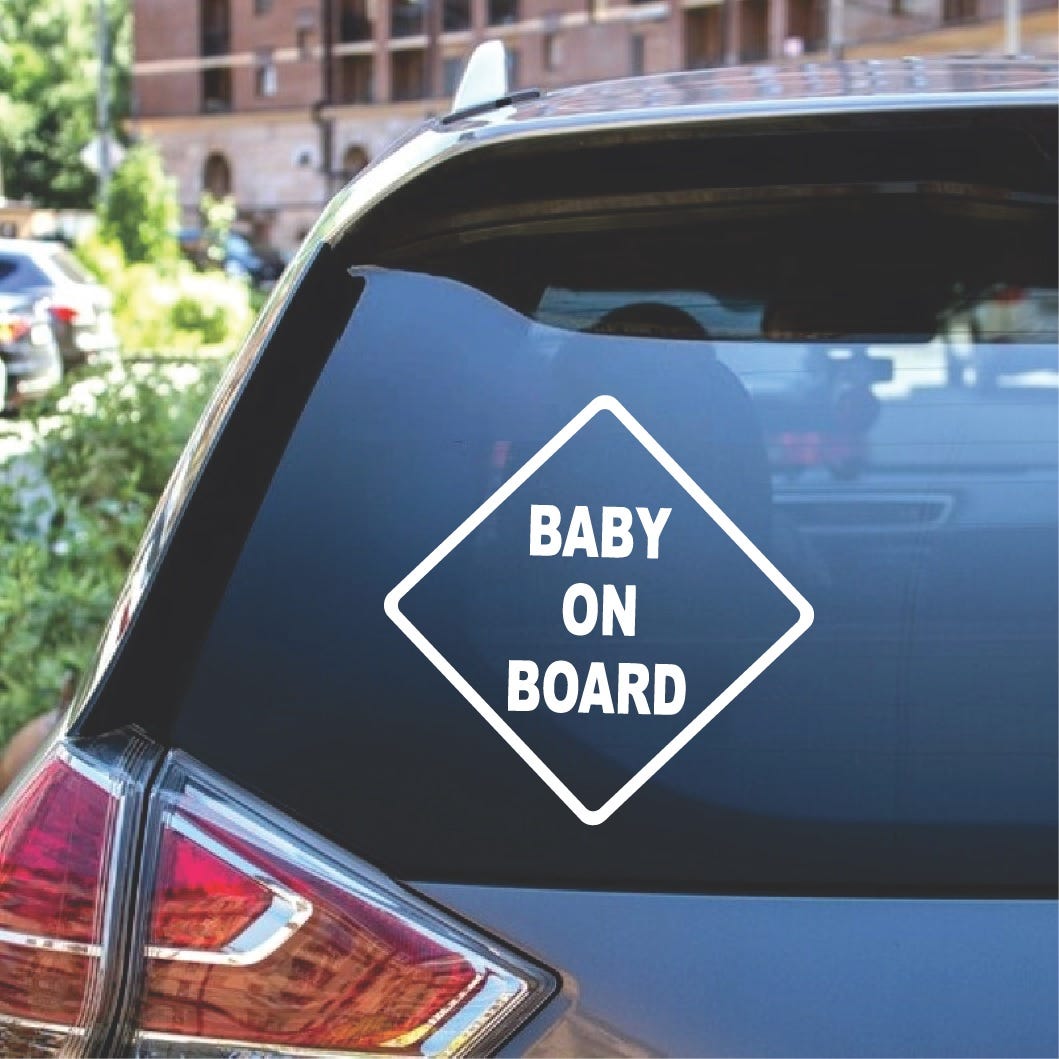 Baby on board stick on the hood of a car