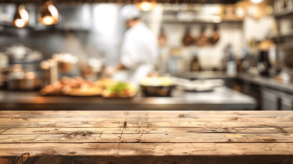 Empty Wood Table Top With Chef Cooking In Restaurant Kitchen Blurred  Defocused Background, Restaurant, Background, Table Background Image And  Wallpaper for Free Download