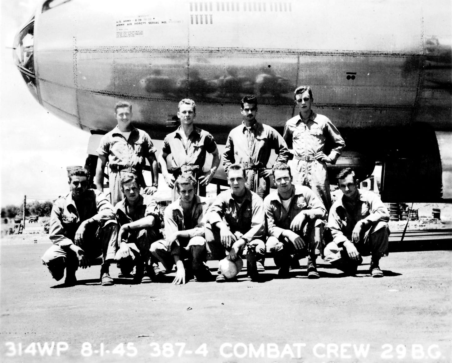 WWII combat crew of Ron Hines, in front of bomber