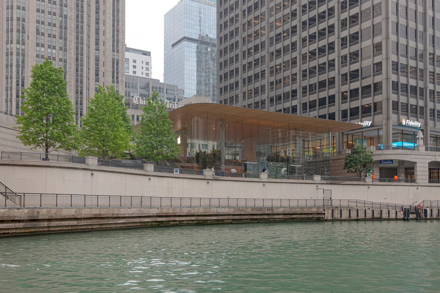 An exterior view of Apple Michigan Avenue shot from the Chicago Riverfront.