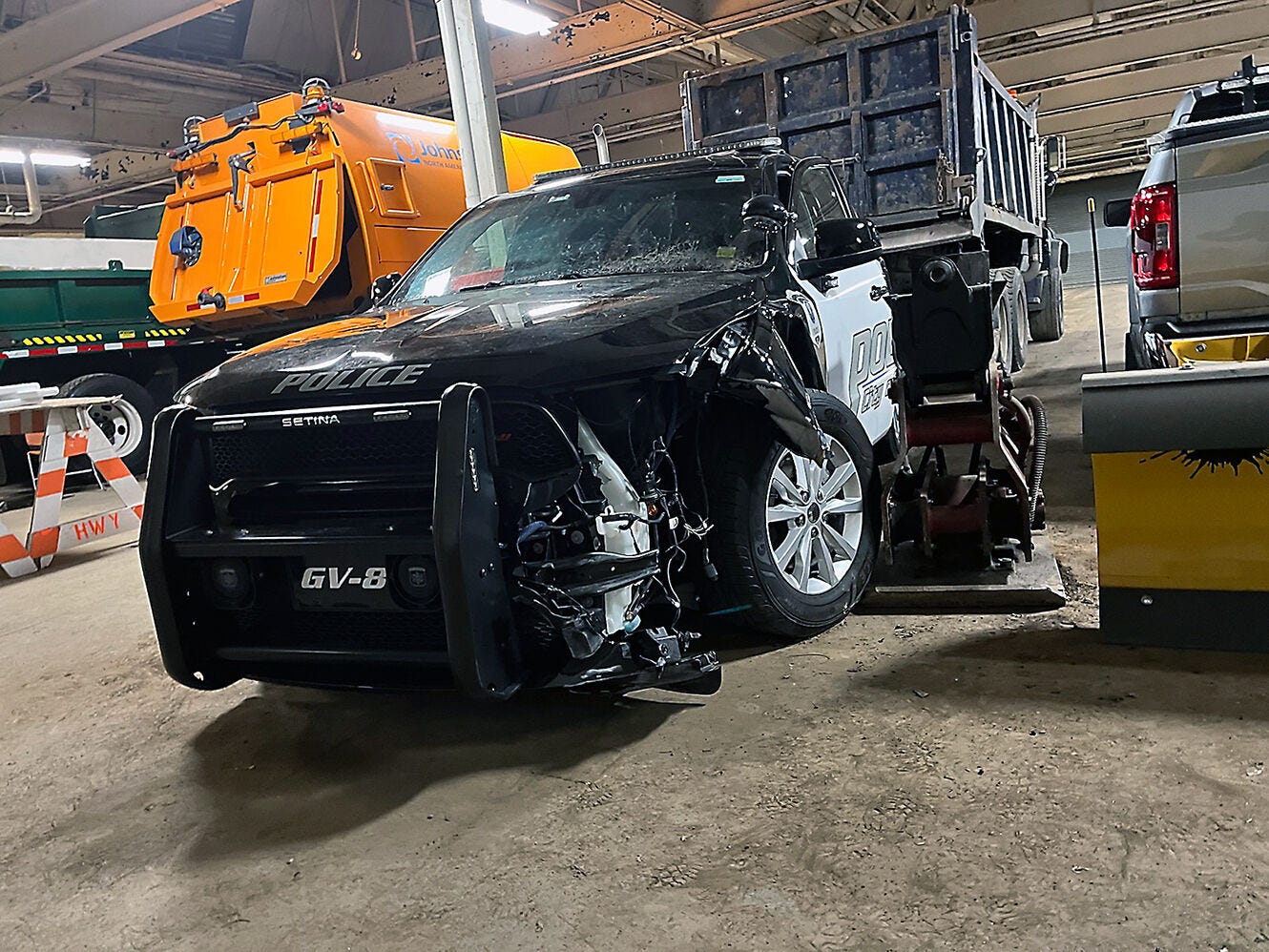 Geneva police officer injured, SUV heavily damaged after parking lot accident