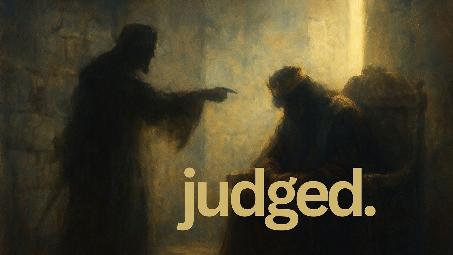 A shadowed hand points toward a seated king wearing a crown, his head slightly bowed as light and judgment converge.