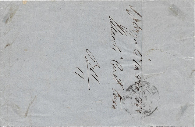 The back of the folded letter in question - can you read this hand-writing or the postmark?