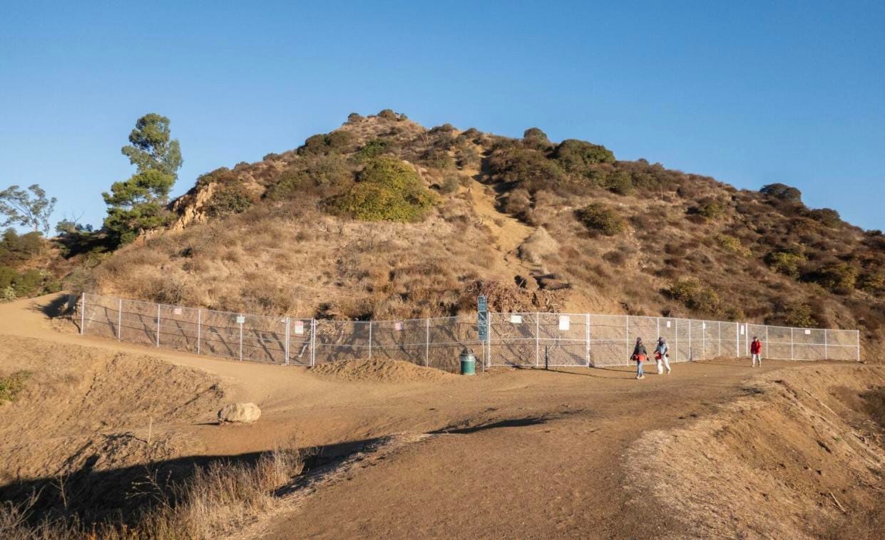 Hikers at Griffith Park in Los Angeles are upset about fences that went up to protect habitat and prevent falls.