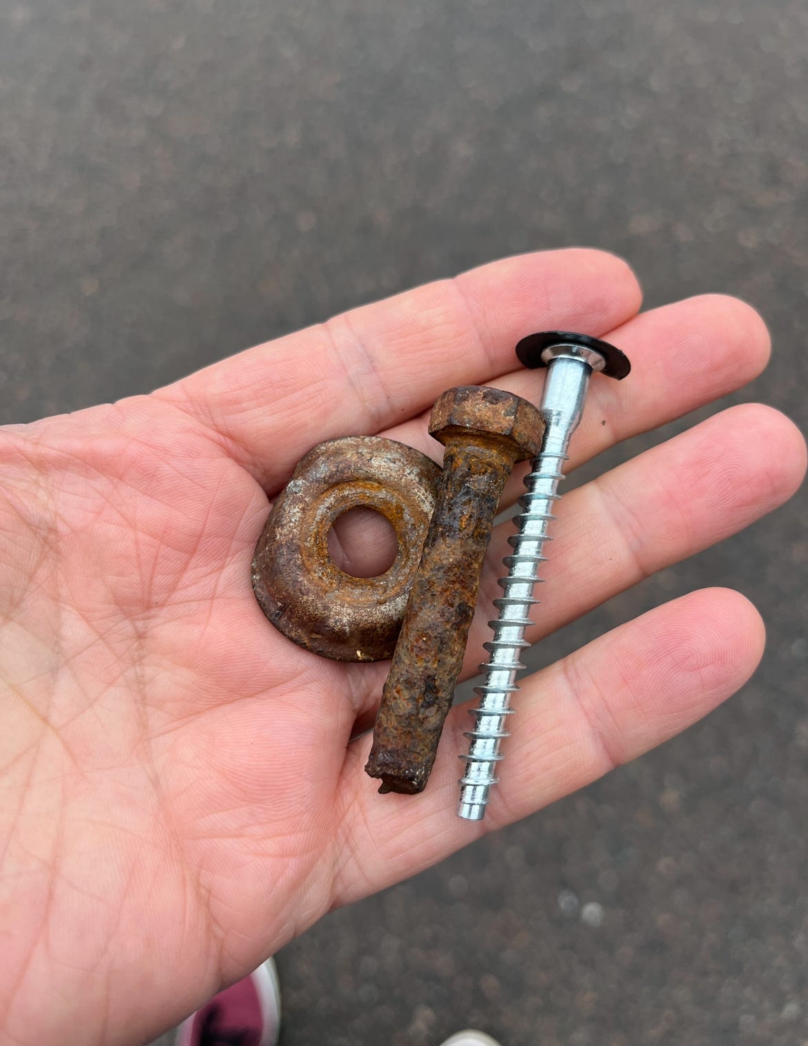 A couple of rusty bolts in my hand