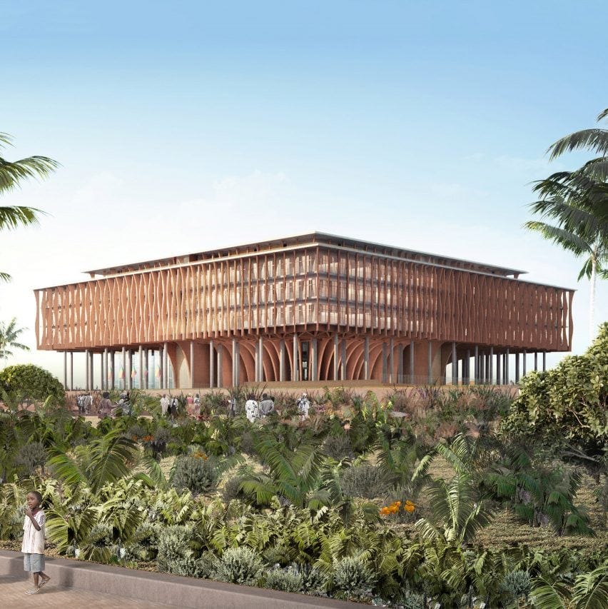 A large square building made of timber, with a design inspired by palm trees