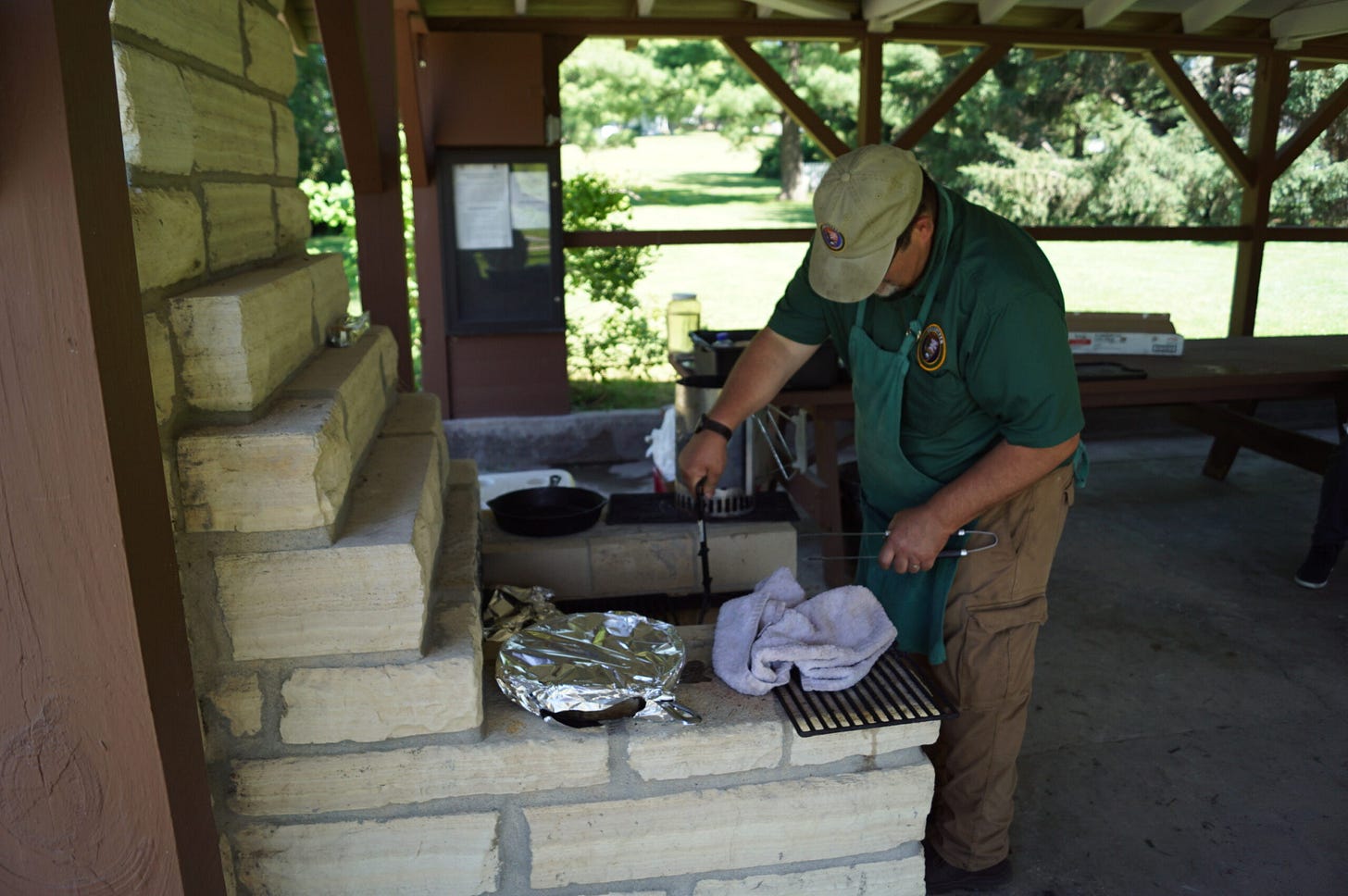 Steven Reed preparing the lunch over the fire