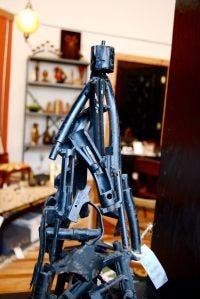 A sculpture made out of recycled gun parts