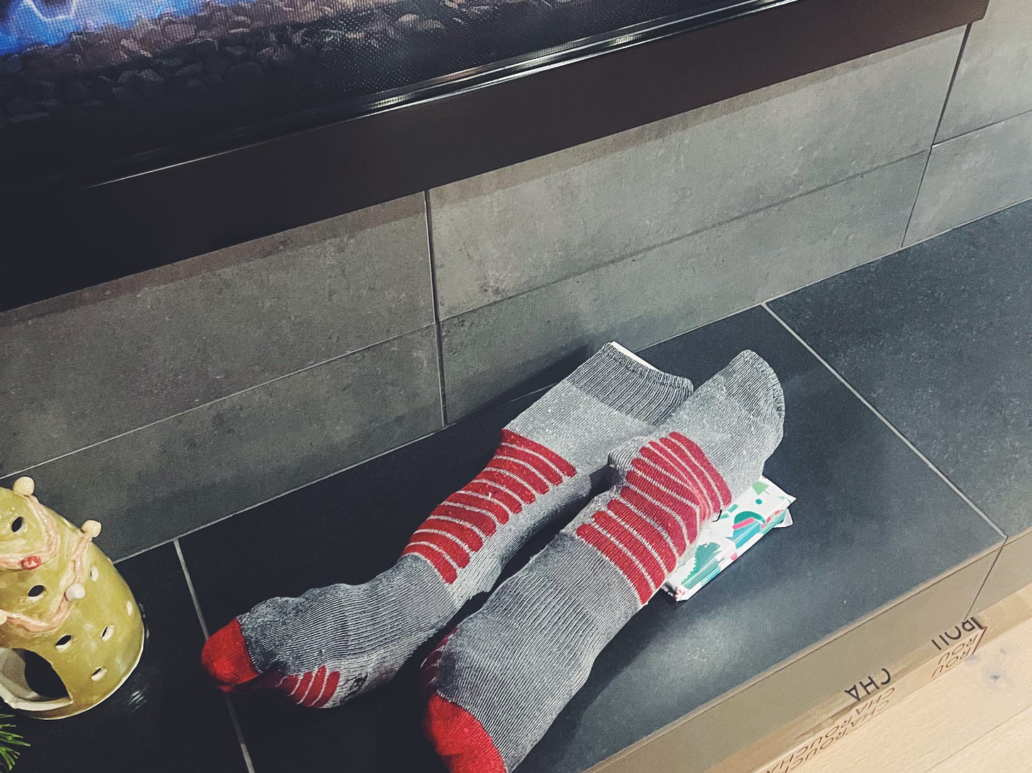 Two lumpy ski socks serving as make-shift Christmas stockings