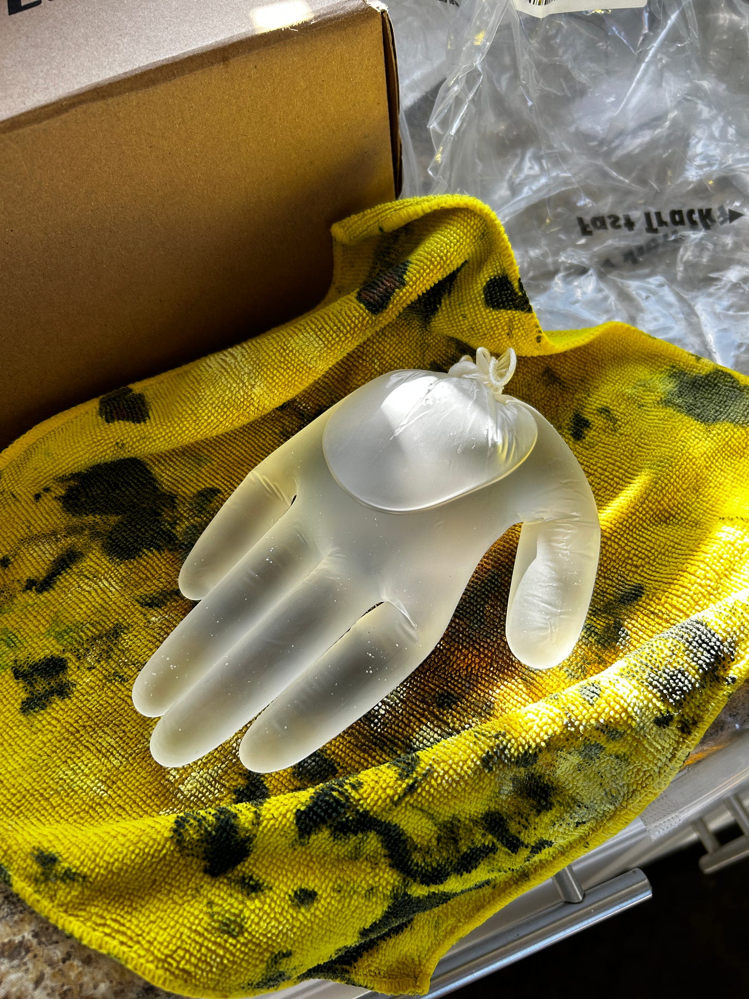 hot water in vinyl glove