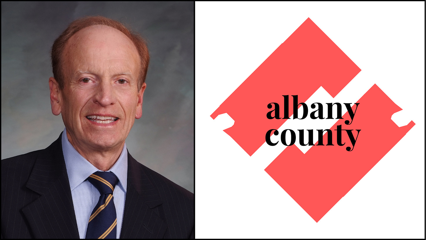 Official legislative portrait of Furphy beside an "Albany County" graphic logo.