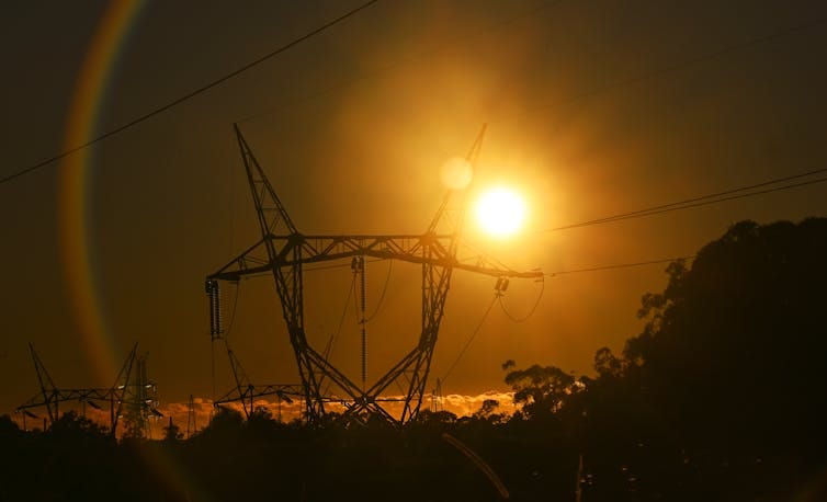 transmission tower at sunset