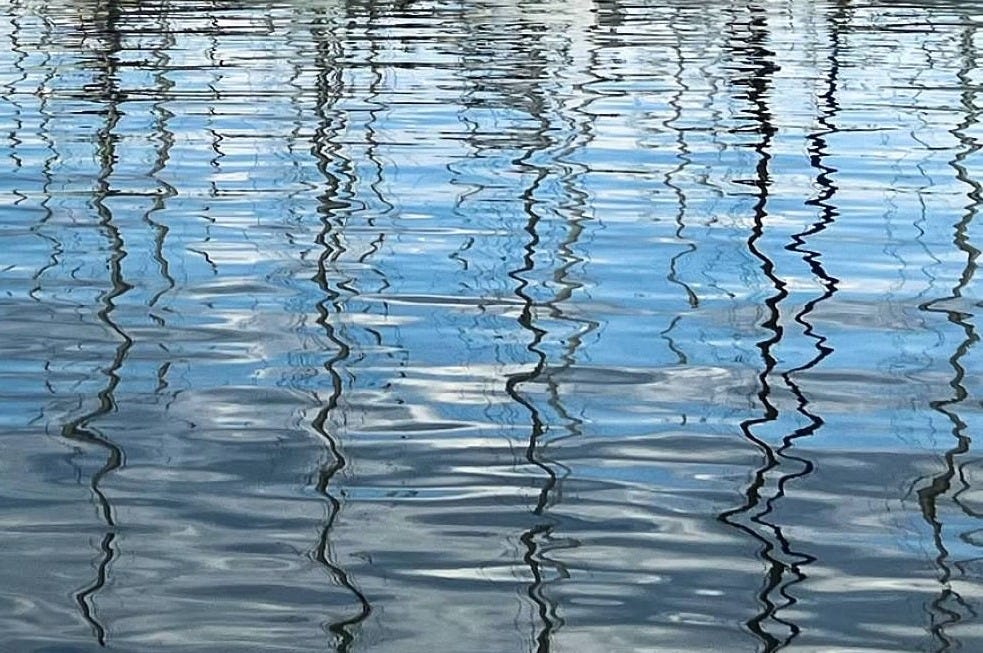 squiggly reflections in wavy water