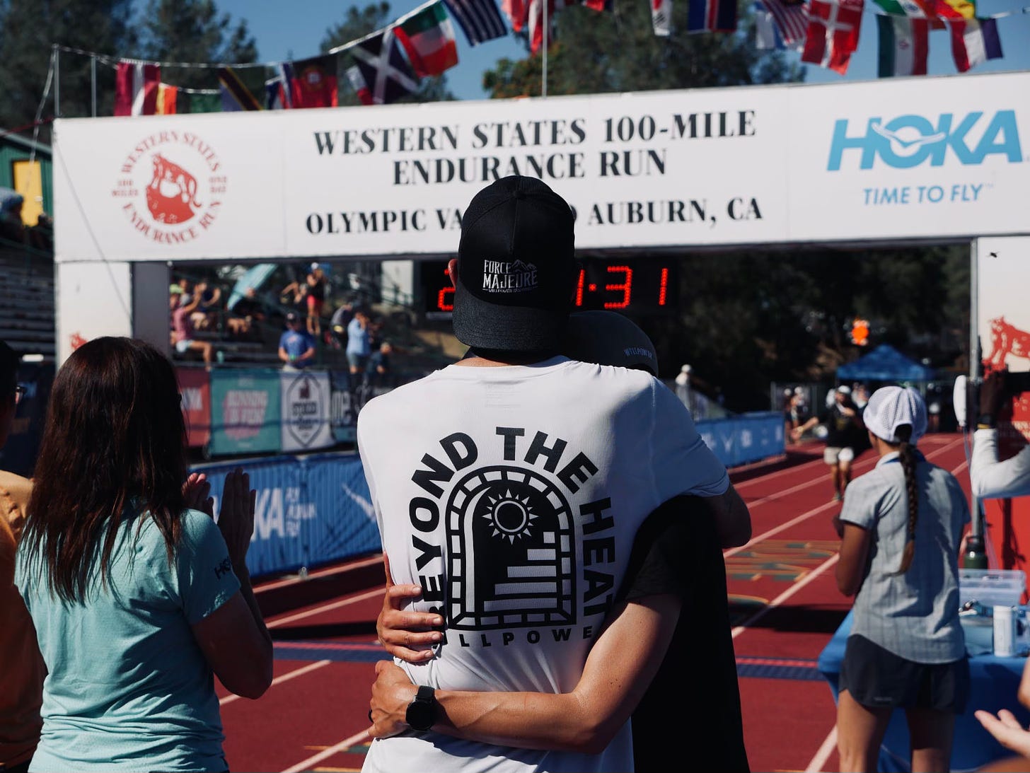 The author giving his wife lisa a hug a the finish line of the western states 100