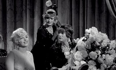 A shot from Some Like it Hot the film, featuring Marilyn Monroe with Jack Lemmon as Daphne and Tony Curtis as Josephine