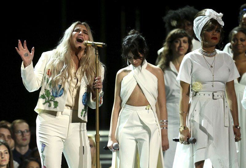 kesha performs praying at grammys 2018 with camila cabello and andra day images