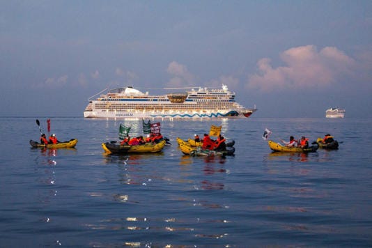 Environmental protesters blocked cruise liners from entering Marseille port